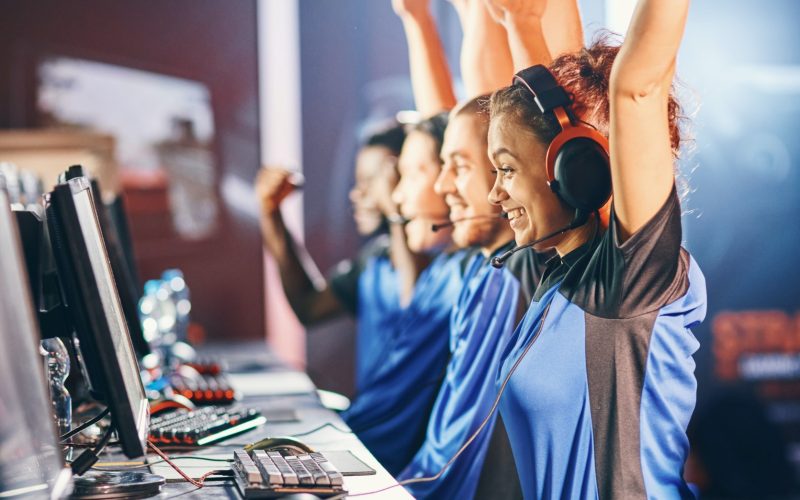 oung-multiracial-team-of-happy-professional-cyber-sport-gamers-celebrating.jpg