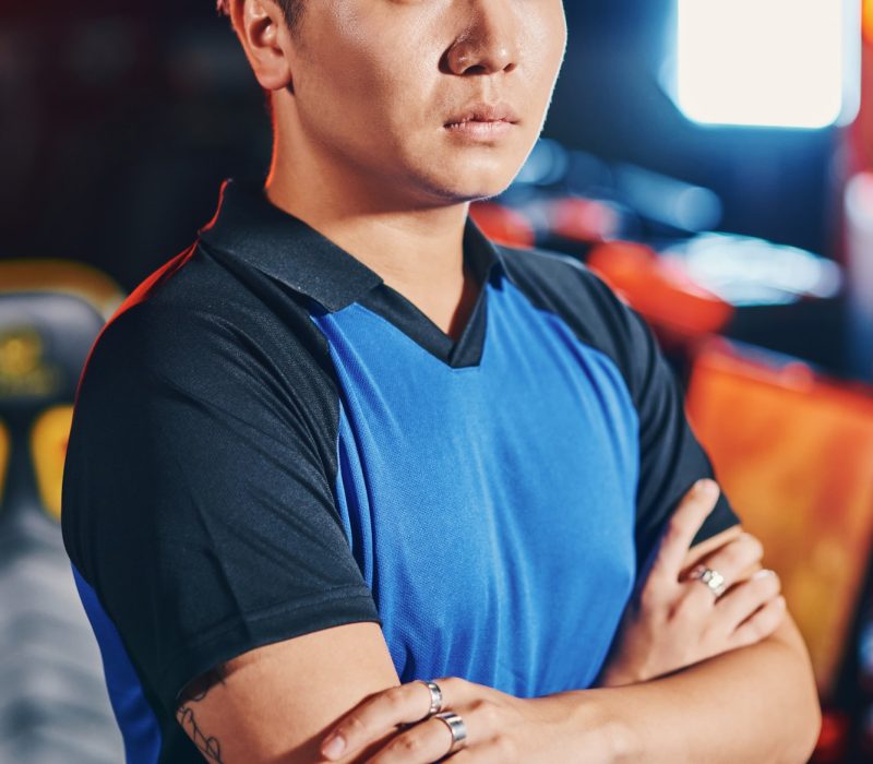 vertical-shot-of-young-asian-guy-male-cyber-sport-gamer-keeping-arms-crossed-and-looking-at-camera.jpg
